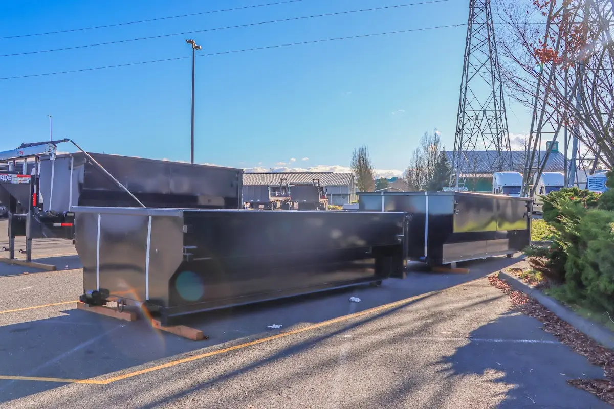 Roll-off dumpster ready for waste disposal at job site for Commercial Dumpster Rental in Elba